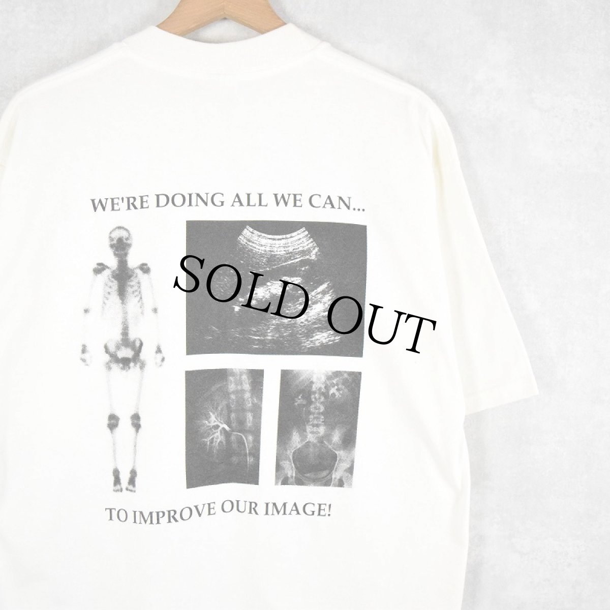 画像1: 90's USA製 "WE'RE DOING ALL WE CAN..." レントゲンプリントTシャツ L (1)