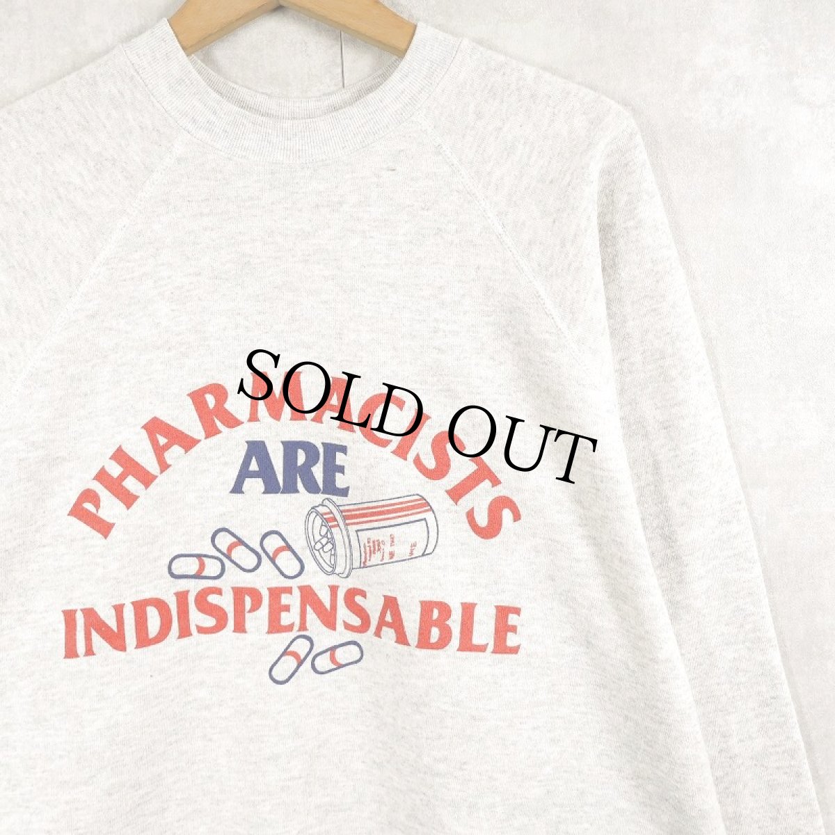 画像1: 90's USA製 "PHARMACISTS ARE INDISPENSABLE" プリントラグランスウェット L (1)