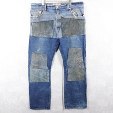 画像1: 2000's Levi's 517 BOOT CUT レザーパッチワーク リメイクデニムパンツ W39 (1)