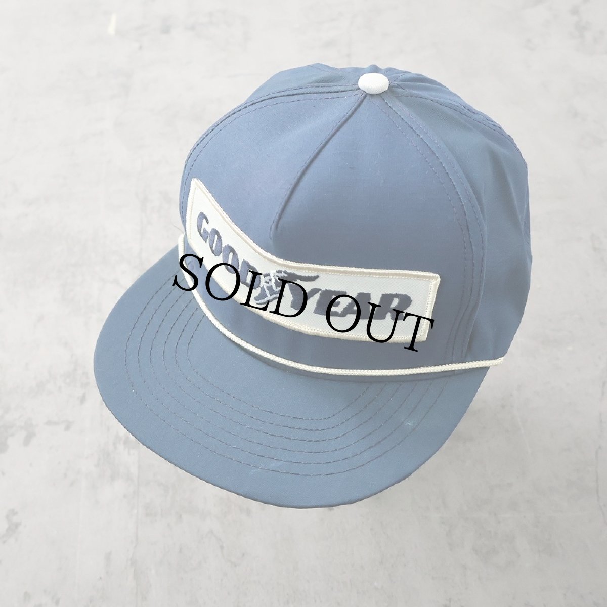 画像1: 80's〜 USA製 ”GOODYEAR" ウイングフット ワッペン付き コットンスナップバックキャップ NAVY ONESIZE (1)