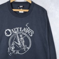 画像1: 90's USA製 "OUTLAWS" スカル プリントTシャツ BLACK XL (1)